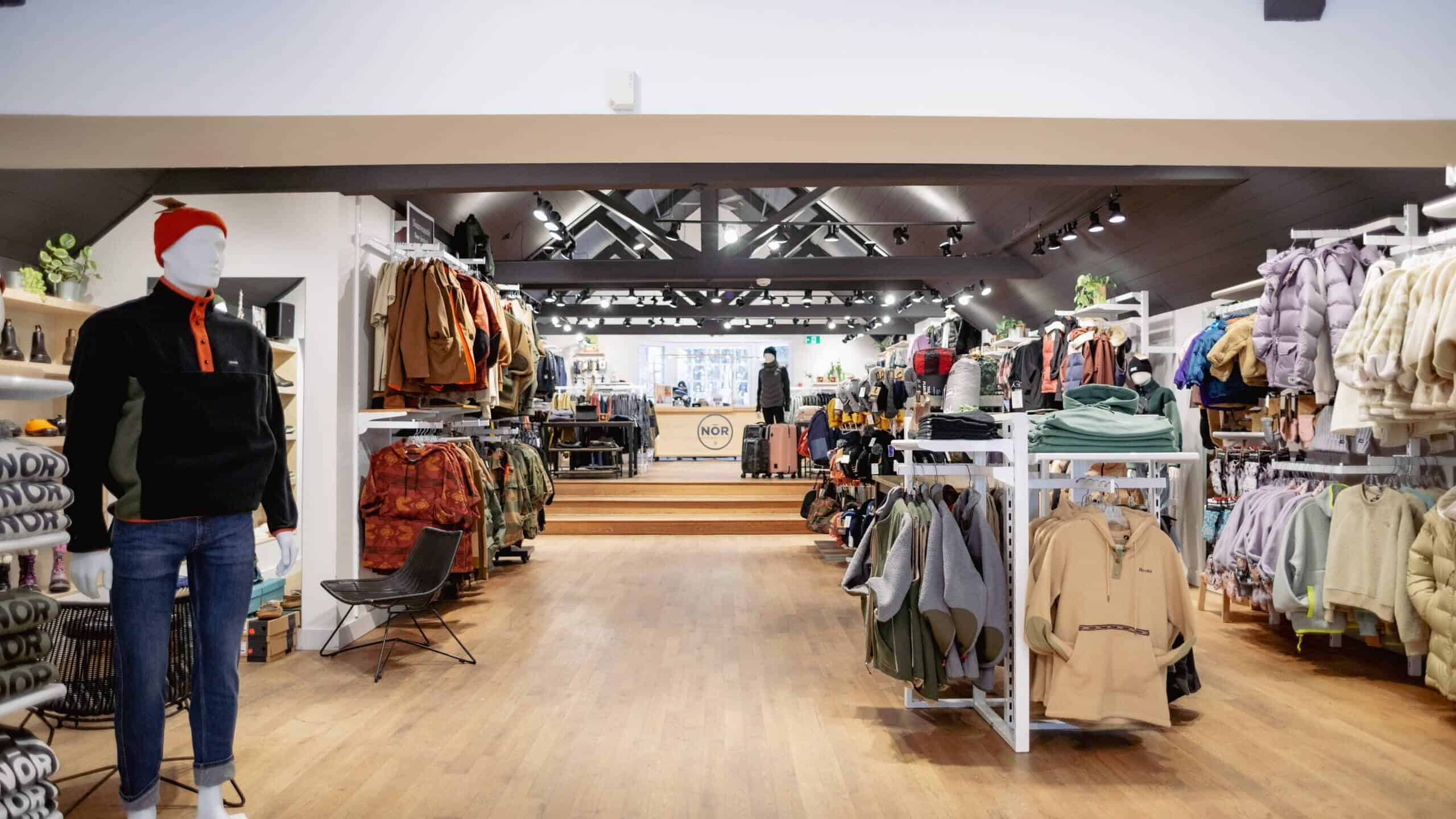Indoor boutique store with clothing displays and mannequins in Tremblant.