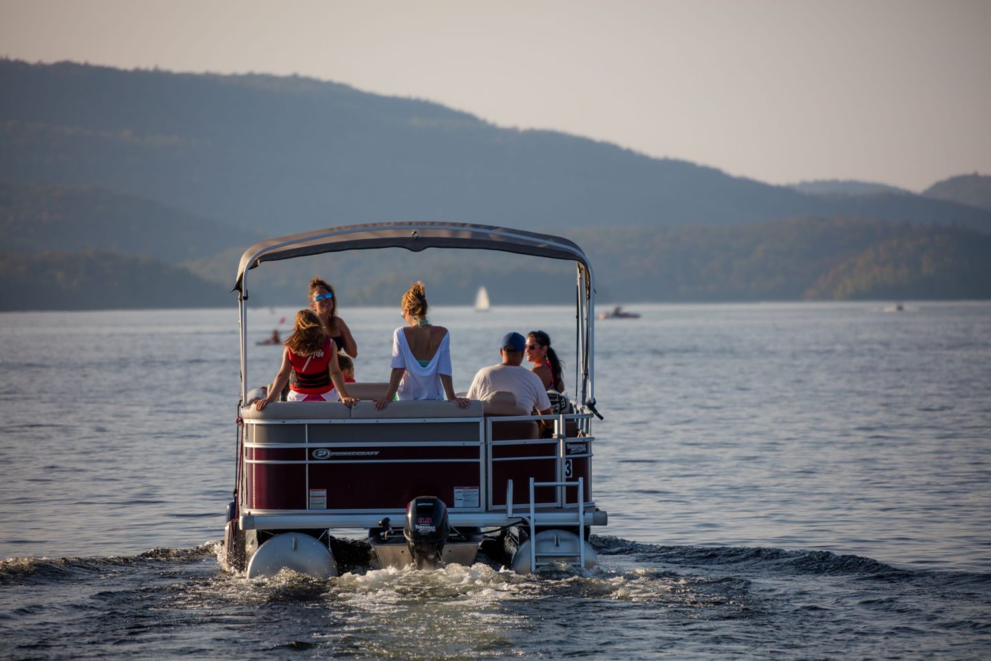Friends on a private pooton ride on Lac Tremblant