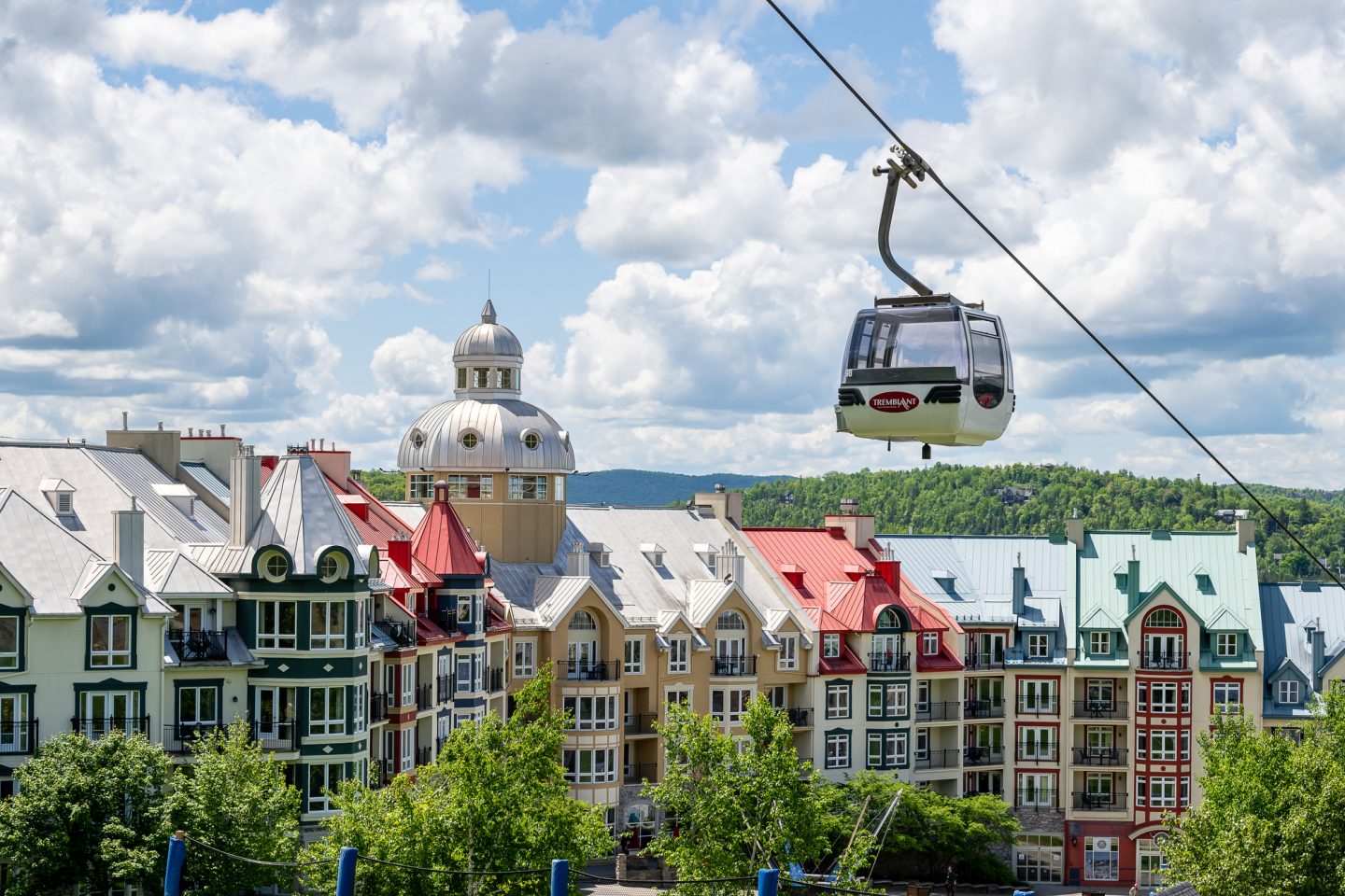Panoramic Gondola in front of Sommet des Neiges hotel